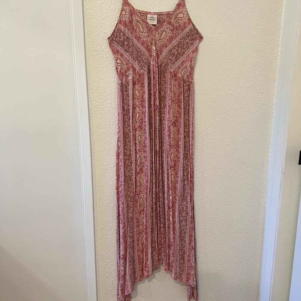 Sassy light pink maxi dress.  Open on the sides